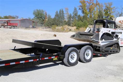 skid steer in dump trailer|tilt bed skid loader trailers.